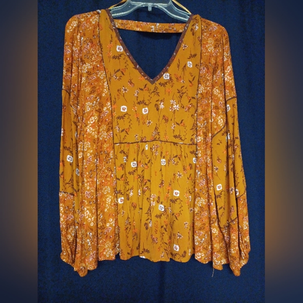 Maurices brown and burnt orange top, size L.